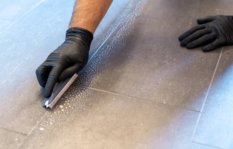 Clean the grout tile lines before adding new grout.