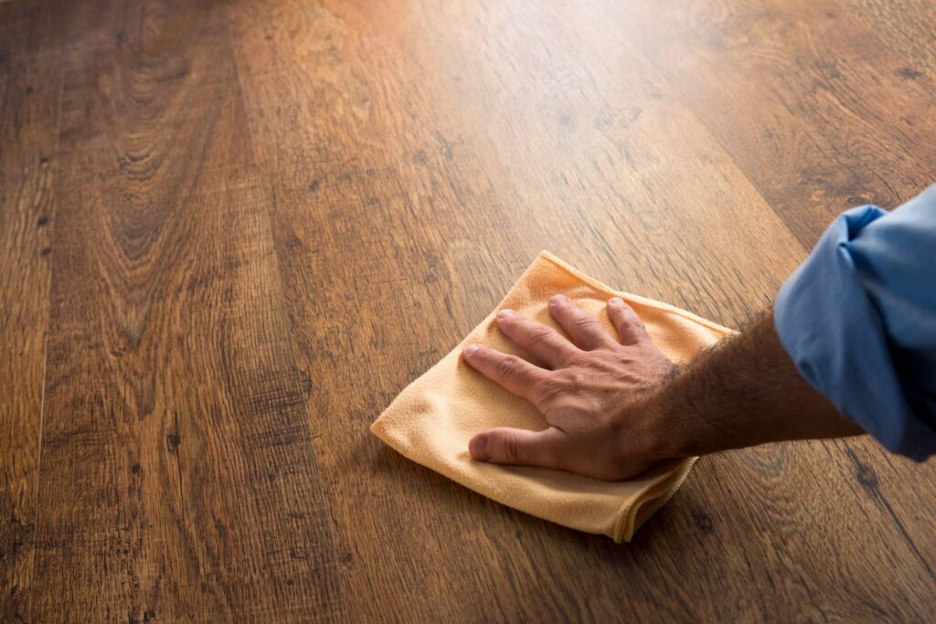 Microfiber cloth can be used as a buffer to get the residue out.