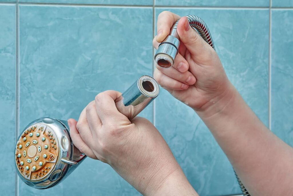 A clogged or lime filled shower head can cause a shower to squeal. 