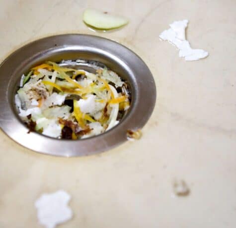 how to unclog a garbage disposal with standing water