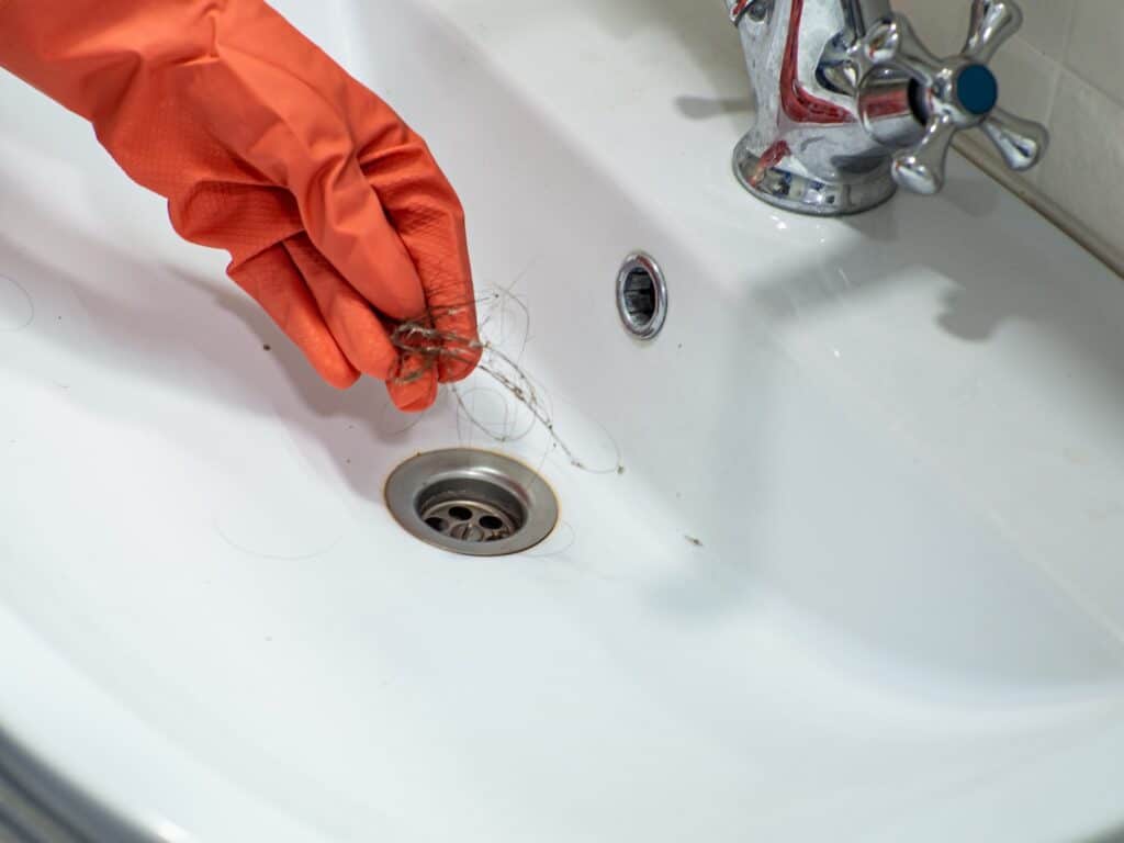 sink drain maintenance like cleaning will help making removing the stopper easier if you ever need to